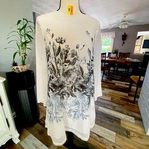 Dress white witch, flowers, and blue black is in good condition